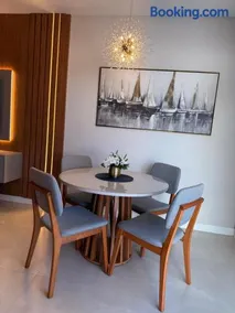 Apartamento moderno, a 200 metros da praia com pátio,piscina e churrasqueira privativa 2 vagas de garagem - Image 2