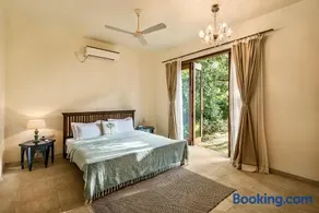SaffronStays Hacienda by the Sea - 5BR Spanish-style pet & elder-friendly pool villa with lawns, beach access & BBQ nights - Image 1