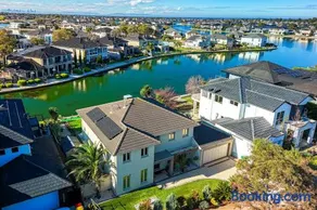 StayAU Sunset Two Story Lakeside Oasis with Scenic Yard - Image 3