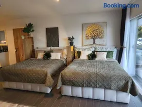 Quiet Apartment in Bulle with Terrace, Free Parking & Mountain Views - Image 1
