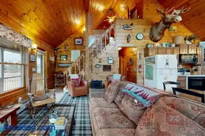 Cozy, dog-friendly waterfront cabin with large yard, porch, dock, & lake views - Image 3