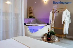 Suite sensuelle balnéothérapie, fauteuil tantra et jardin - Image 1