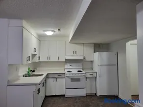 Executive Cozy 2bedroom Basement Suite - Image 1