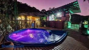 Chalés e Suítes Jardim do Buda com piscina aquecida - Image 4