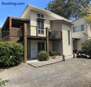 Beach House with Games Room & Deck Gone Coastal - Image 1