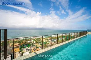 Hospede-se a passos da praia de Itapuã, com piscina e academia - RGF - Image 4