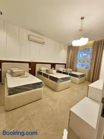Al Ain Hotel Apartment Family Stay with Balcony and Pool Access - Image 3