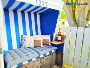 Charmant appartement de vacances adapté aux familles avec barbecue et terrasse | À côté de la plage | Avec animaux autorisés - Image 4