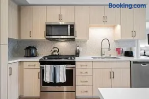 Bright 2BR Retreat - Pool, Spa & Garage Parking - Image 1