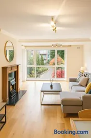 Gracepark Garden Retreat, Spacious 2BR with Balcony & Parking - Image 1