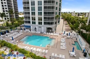 Beachfront Bliss Cozy Condo with Patio Pool & Stunning Views - Image 1