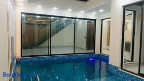 Luxury DHA Villa 2 BHK with tv lounge and Paid Private Indoor Pool - Choose high speed internet rate to include pool - Image 3