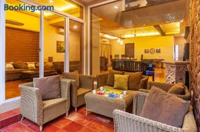 StayVista's The Happy Hive - Cozy rooms and a pool for a delightful stay - Image 5