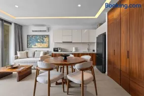 Cozy Modern Condo with Scenic Balcony Views - Image 3