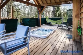 Charmante Cabane dans les arbres avec jacuzzi et sauna - Image 3