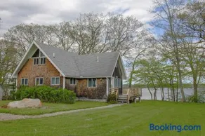 Remodeled Waterfront Home with Wraparound Deck, Water Views, & Beach Access - Image 2