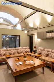 ELIVAAS Signature Stone Age Home Fernwood 6-BHK Stone-Clad Estate with Bamboo Cottages, Private Pool, Gazebo & Terrace Garden - Image 1