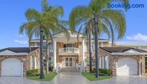 Stunning 4BR Holiday Home with Water Views & Pool - Image 2