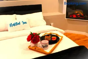 Nestled Inn Bed and Breakfast - Image 2