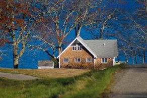 Remodeled Waterfront Home with Wraparound Deck, Water Views, & Beach Access - Image 3
