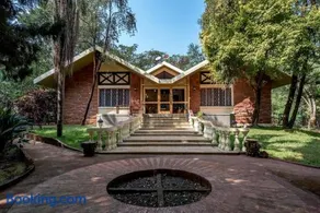 SaffronStays Foresta by the Lake - 6BR veg-only pool estate with lake views, lawns, gazebo & sports court in Kamshet - Image 2
