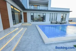 Al Tharaa Chalet استراحة الثراء - Image 2
