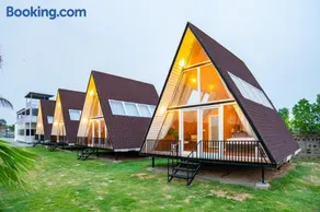 ELIVAAS Signature Malik Farms Countryside Wooden Cottage on 2 Acre Estate with Shared Pool, Garden & Restaurant - Image 3