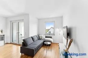 Charmante & Moderne Neubauwohnung mit Balkon - Image 1