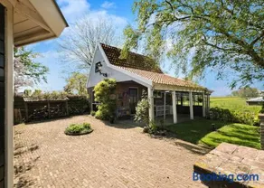 Idyllisch en knus huisje met prachtige veranda. - Image 1