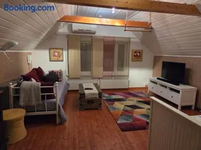 Guesthouse Onnia, kattohuoneisto Siurossa - Image 1