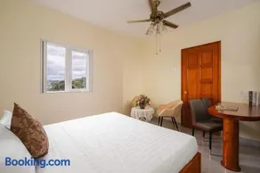 CandlePine Suites - Khách sạn căn hộ - Image 1