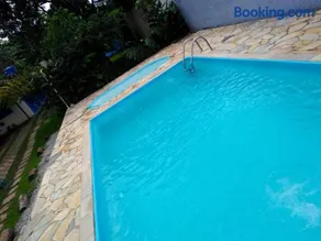 Chácara a 450mt da Praia Boracéia piscina infantil e outra adulto - Image 5