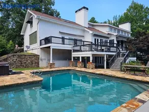 Lake Lanier Lakefront, 7B 6BA 11 beds, private pool, dock, and sand volleyball court 9200 sqft - Image 1