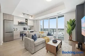 Sleek 2BR Condo with Balcony & Skyline Views - Image 2