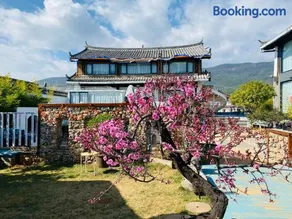 玉龙白沙普宿客栈 - Image 1