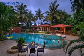 SaffronStays Euphoria Shores - 6BR villa with bar counter, pool & lawns 400m from Kihim Beach in Alibaug - Image 1
