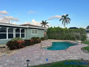 Coastal Getaway with Pool & Dock - Image 1