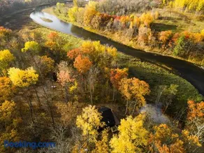 Riverside Retreat: Unwind in a Cabin with Private Steam Sauna on the Pine River - Image 4
