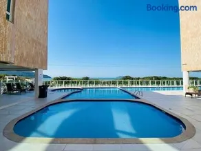 Apt Pé na Areia Floripa - Praia dos Açores - Churrasqueira na Varanda e Piscina - Image 1