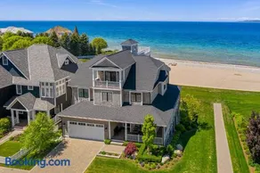 Lake-view luxury awaits at Serenity North 4 in Bay Harbor, MI, with 4 bedrooms. - Image 1