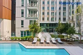 Luxury 2BR Apartment with Pool, Balcony & Parking - Image 1