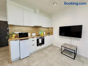 Modern Apartment with Balcony & Private Parking - Image 4