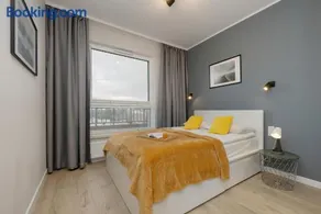 Unique Szczesliwa Apartment with Balcony Parking and AC by Noclegi Renters - Image 2