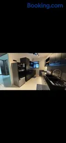 Bliss by Glass Loft-Fully furnished 2BHK near KIMS Hospital - Image 2