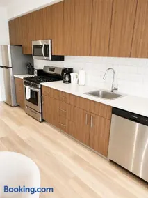 Central 1BR Condo in Sidney Near Airport & Shops - Image 1