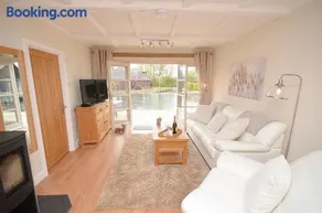 Dutch Cottage sits in its own basin off the River Bure in Horning - Image 2