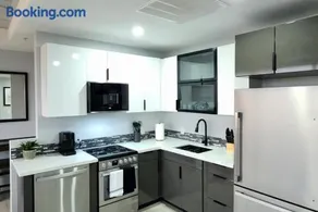 Modern Two Bedroom Apartment with City Views - Image 4