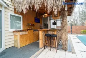 Tropical Oasis with Tiki Bar, Firepit, Seasonal Pool - Image 2