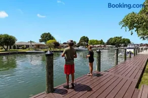 NEW! 4BR I Indoor Pool on the Bay in Boat Town USA - Image 5