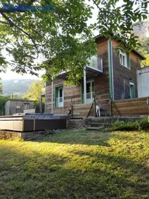 Maison au bord de l'eau avec Jacuzzi - Image 1
